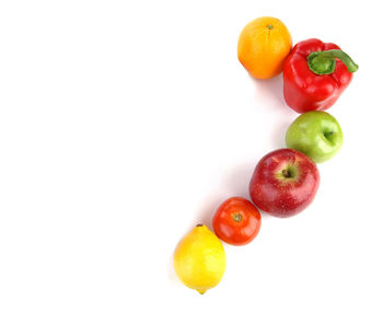 Close-up of tomatoes against white background