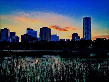 City lit up at dusk