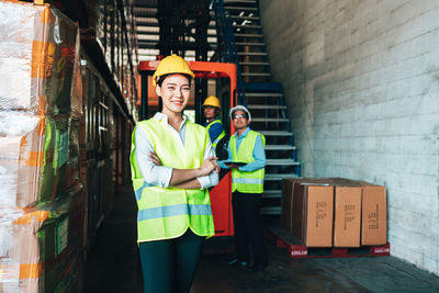 Portrait of people working at construction site