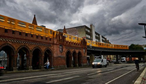 View of buildings against cloudy sky