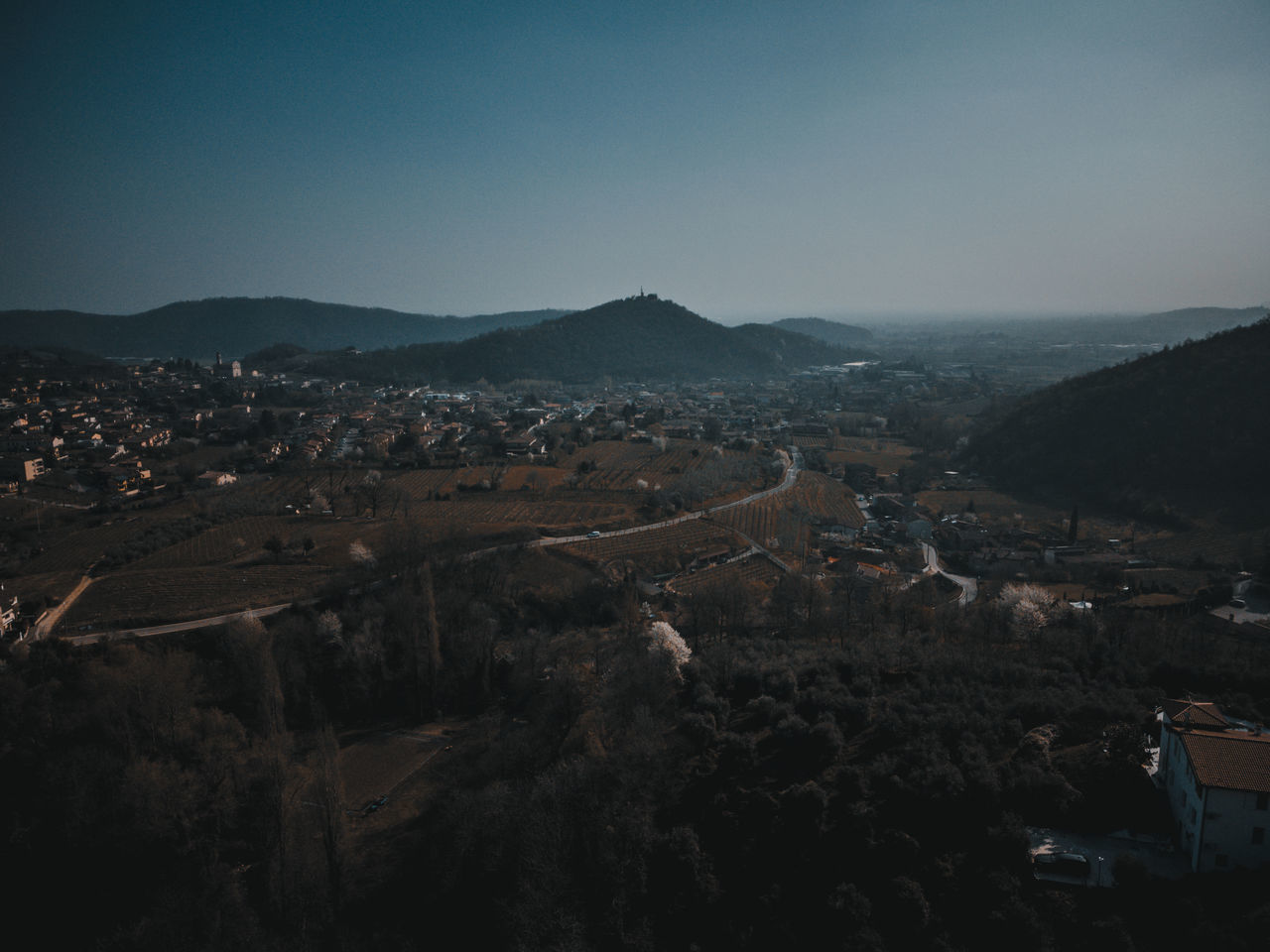 HIGH ANGLE VIEW OF TOWNSCAPE AGAINST SKY DURING SUNRISE