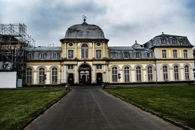 Facade of historic building against sky