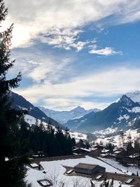 Scenic view of mountains against sky during winter