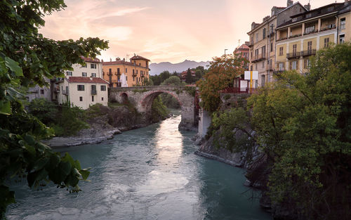 View of river with buildings in background