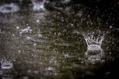 Close-up of water splashing on lake