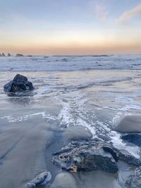 Scenic view of sea against sky during sunset