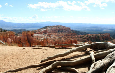 Scenic view of rock formations against sky