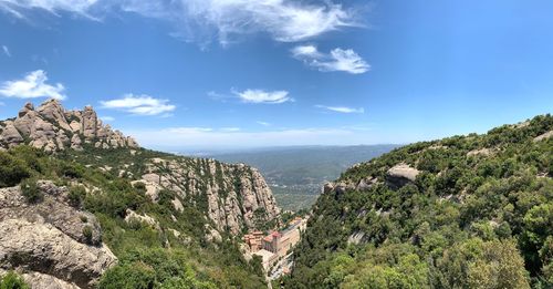 Sunny looking down at monserrat monastry from the top of the funicular 