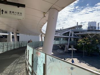 Bridge against sky in city