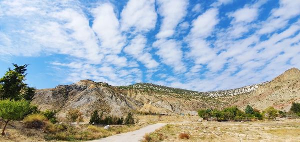 Panoramic view of landscape and mountains against sky