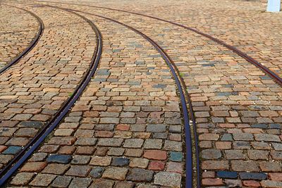 Street lights on cobblestone street