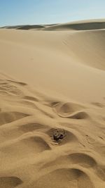 Scenic view of desert against clear sky