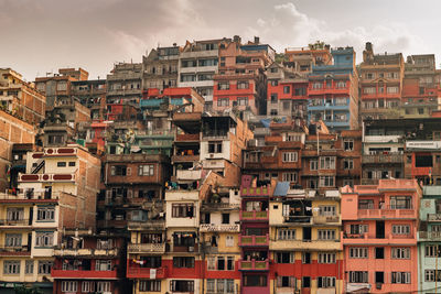 Full frame shot of residential buildings against sky