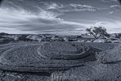 Stack of landscape against sky