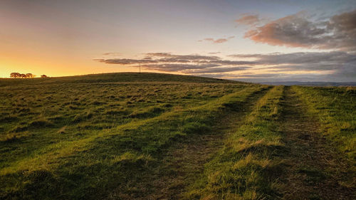 Scenic view of landscape against sky during sunset