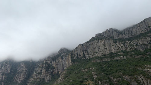 Scenic view of rocky mountains against sky