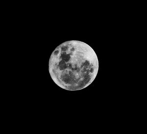 Full moon against clear sky at night