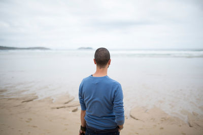 Man standing on beach