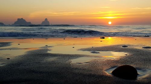 Scenic view of beach during sunset