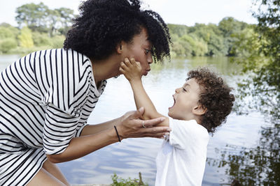 Mother with son playing together