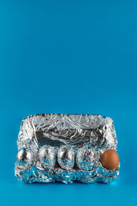 High angle view of bread against blue background