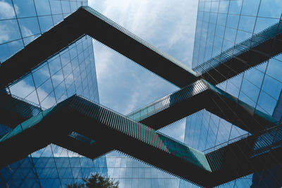 Low angle view of modern buildings against sky