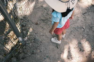 Low section of woman standing outdoors