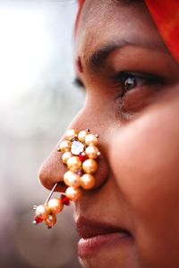 Close-up of woman with nose ring