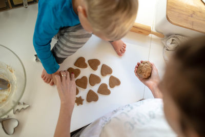 High angle view of people on table