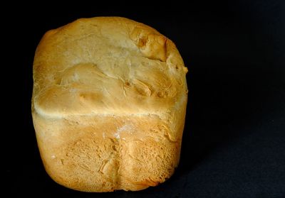 High angle view of bread against black background