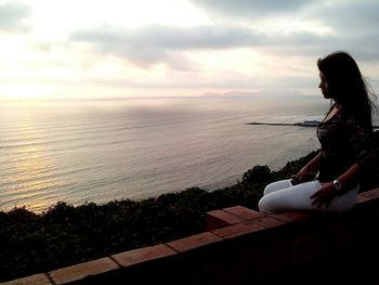 View of calm sea at sunset