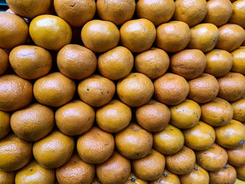 Full frame shot of oranges in market