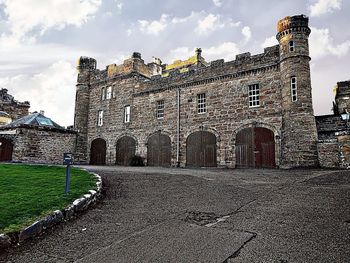 View of historic building against cloudy sky