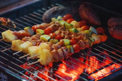 Close-up of meat on barbecue grill