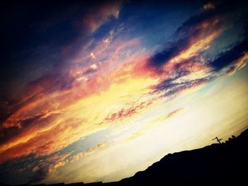 Scenic view of landscape against cloudy sky