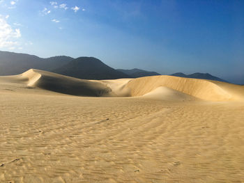 Scenic view of desert against sky