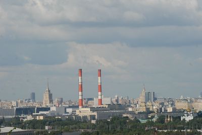 Buildings in city against sky