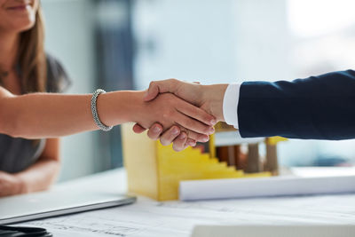 Business colleagues shaking hands