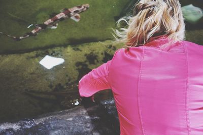 Reflection of woman in water