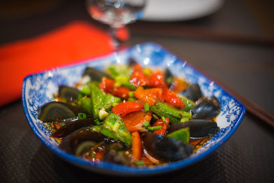 High angle view of chopped vegetables in bowl on table