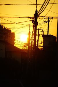 Electricity pylon at sunset