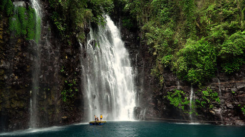 Waterfall in the jungle of the philippines. tinago falls in the tropical forest. iligan city