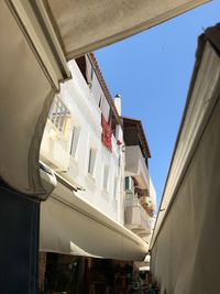 Low angle view of buildings against clear sky