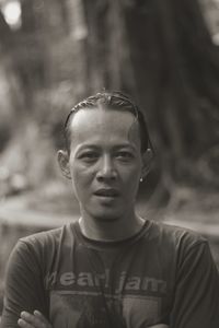 Portrait of young man standing outdoors