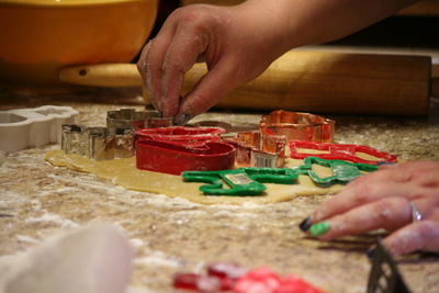 Close-up of hands on table