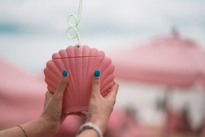 Close-up of woman holding hands