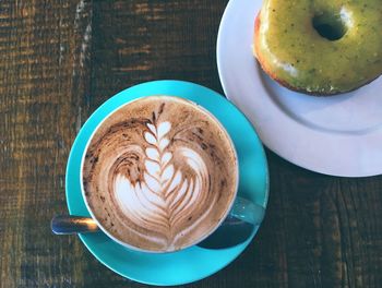 High angle view of cappuccino on table