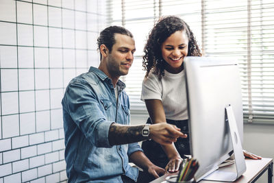 Business people working at desk in office