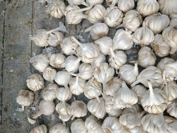 Full frame shot of garlic for sale in market