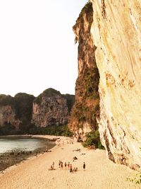 Tourists on rock formation